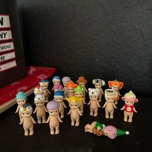 Adorable Collectible Doll Set with Colorful Hats